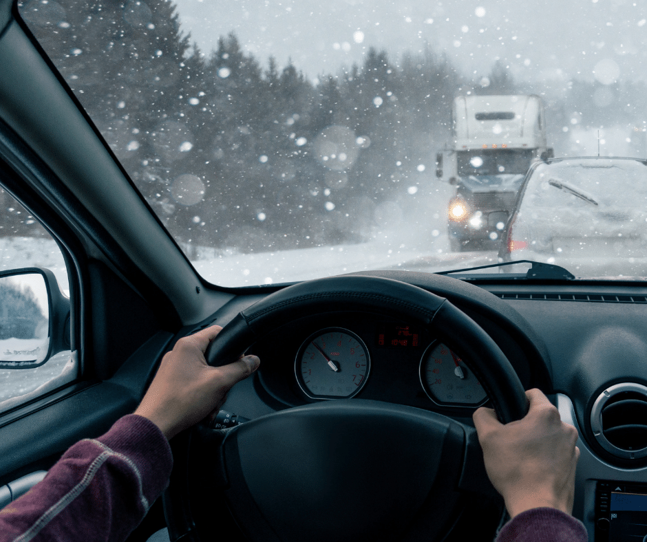 Image of someone driving in the winter