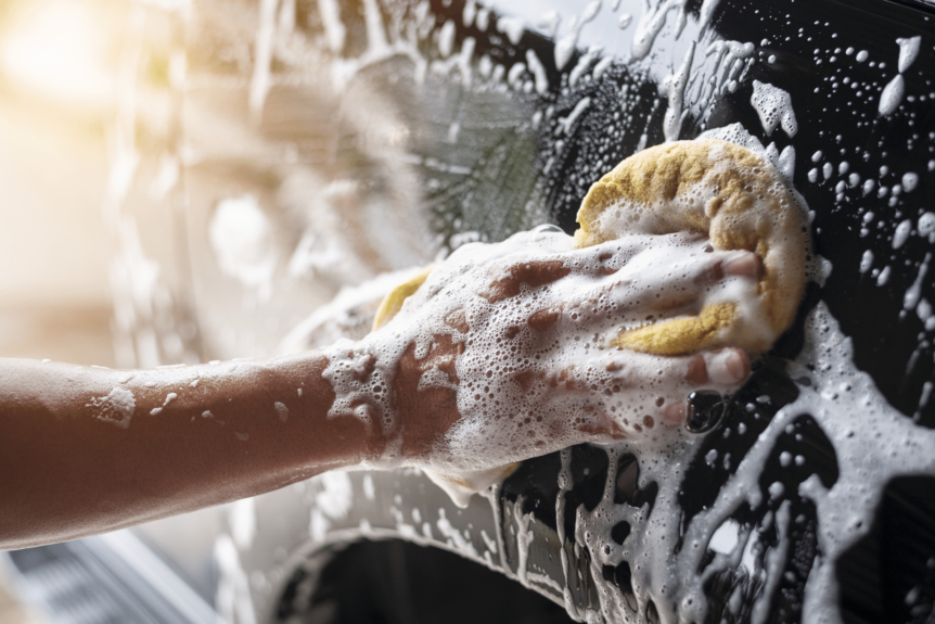 Image of car being hand washed