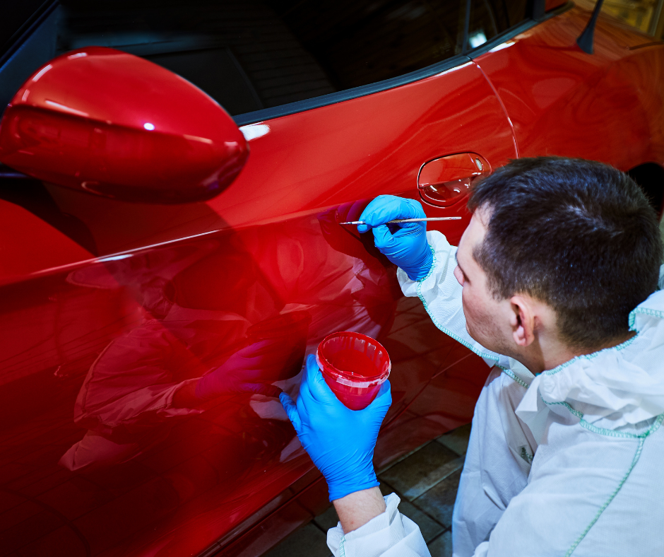 Image of car painting being done to a car's auto body